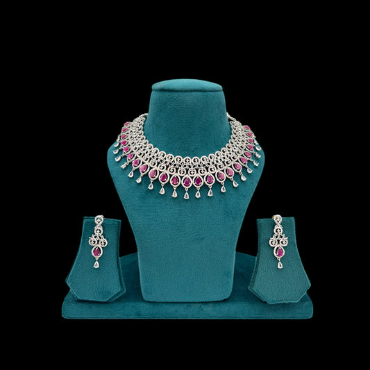 Rhodium plated American Diamond necklace set with ruby stones and earrings