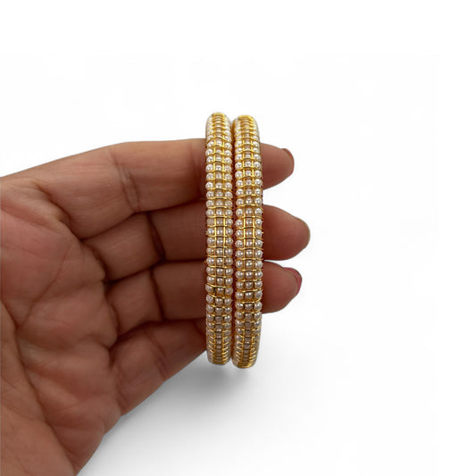 Gold plated pearls bangles