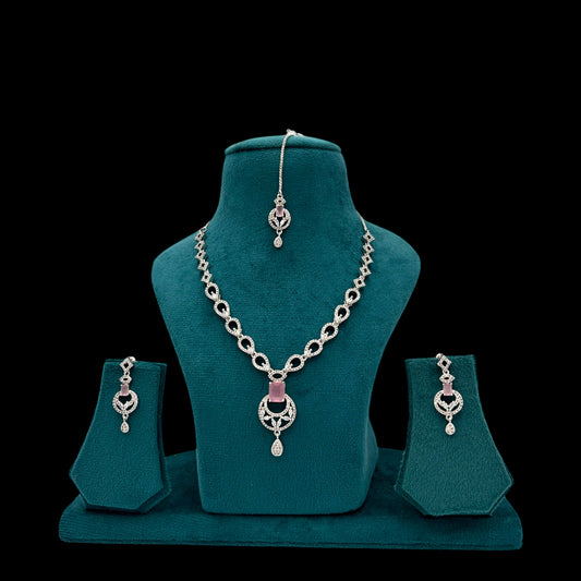 Pink American Diamond necklace set with matha tikka and earrings.