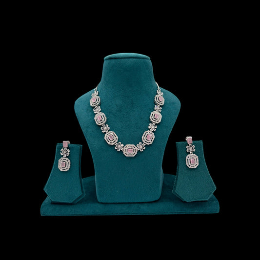 Pink American Diamond necklace set with rhodium polish paired with earrings.