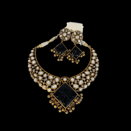 Contemporary gold necklace set