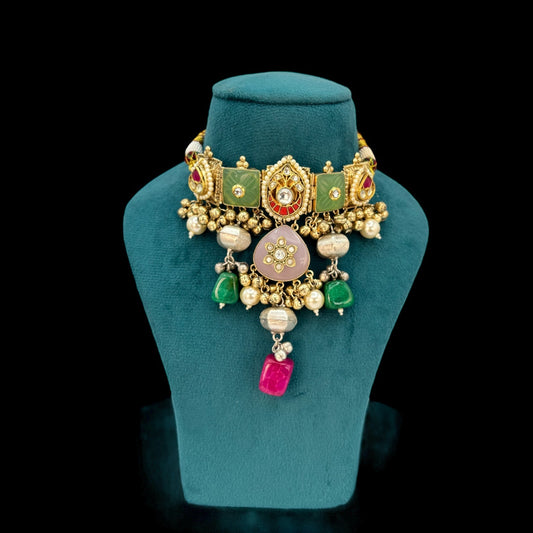 Beautiful pachi kundan choker and colourful doblet stones.