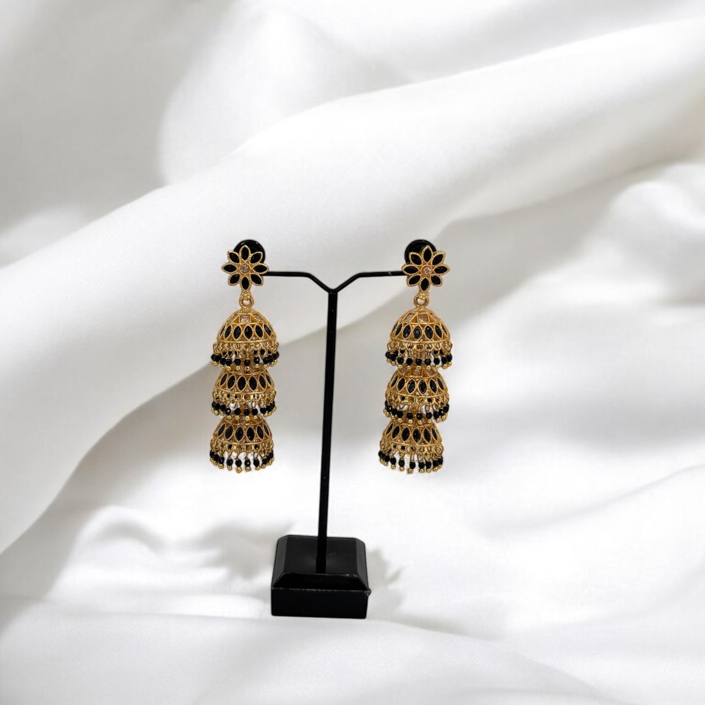 Gold tone three layered jhumki earrings
