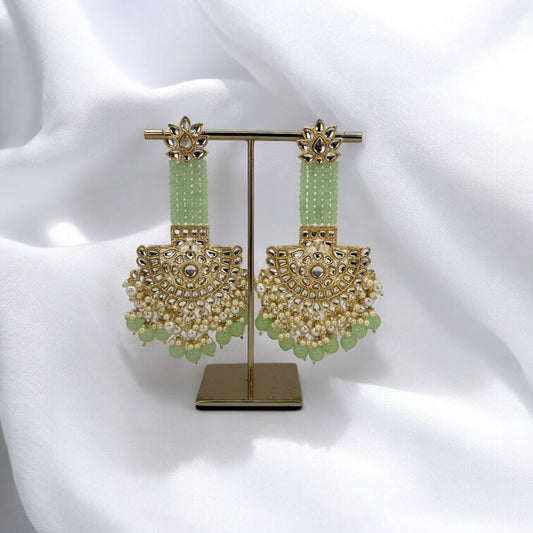 Pastel green hand made long kundan earrings