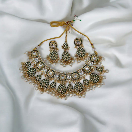 Green kundan necklace set with matha tikka