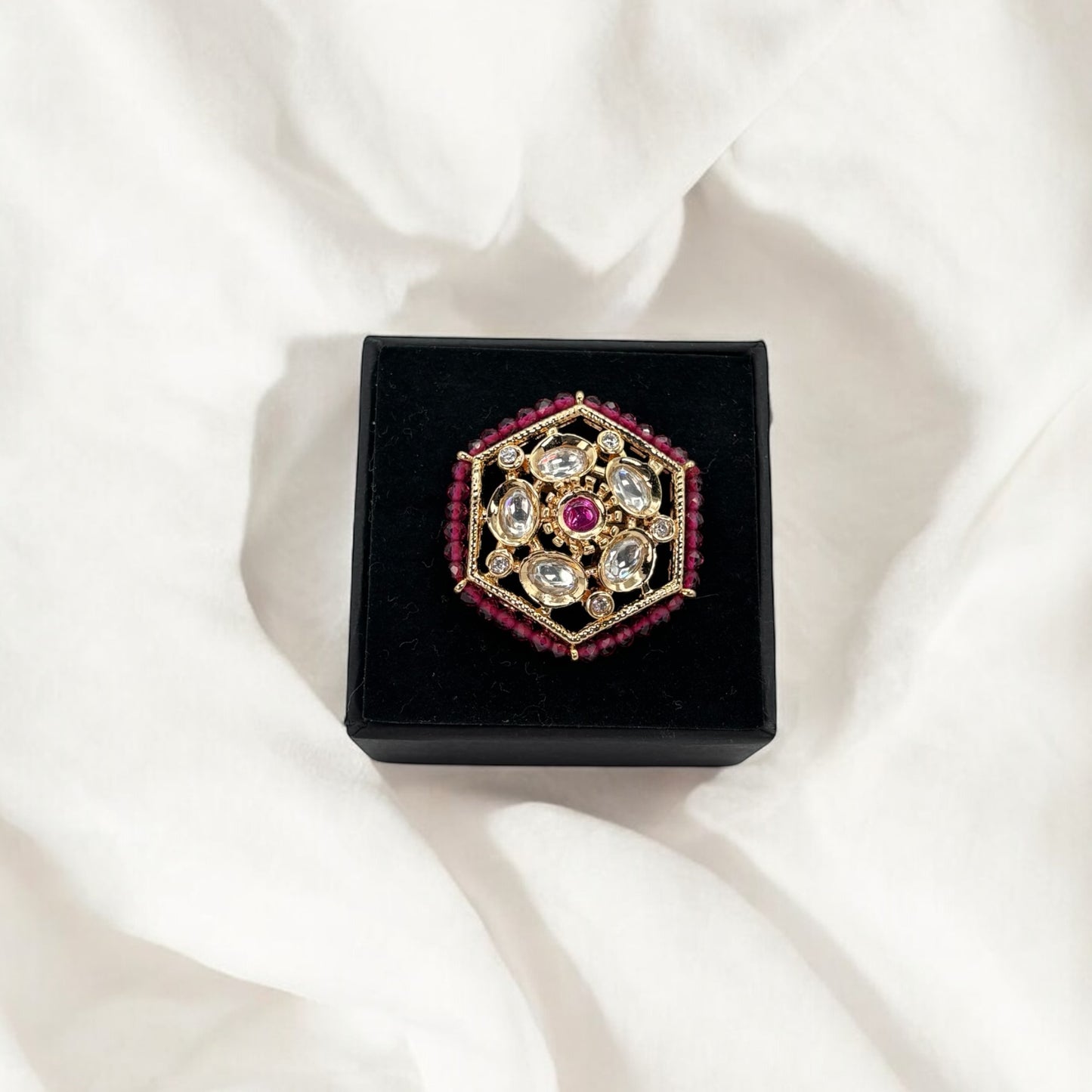 Green, pink and white Kundan rings