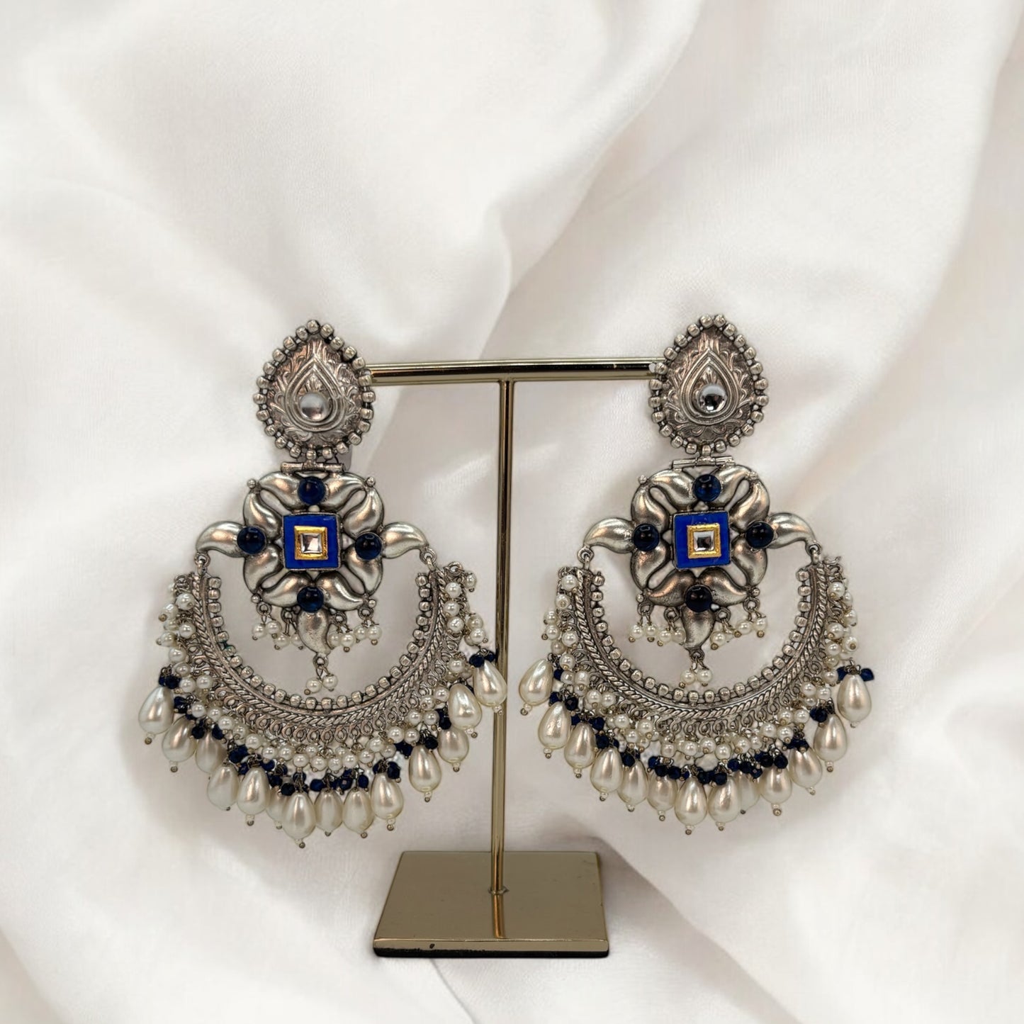 Silver big earrings with blue stones