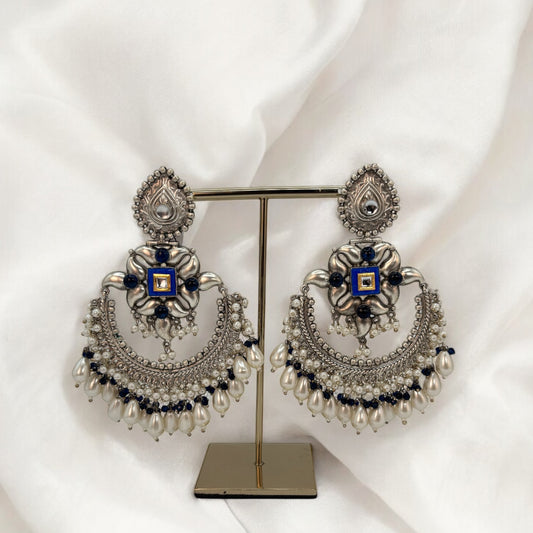 Silver big earrings with blue stones