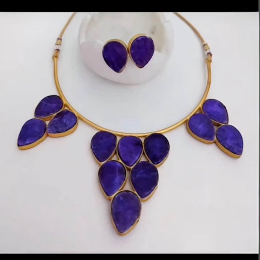 Gold plated hasli with purple natural stones