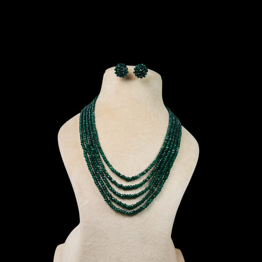 Handmade five layered  emerald green onyx stones mala with studs.