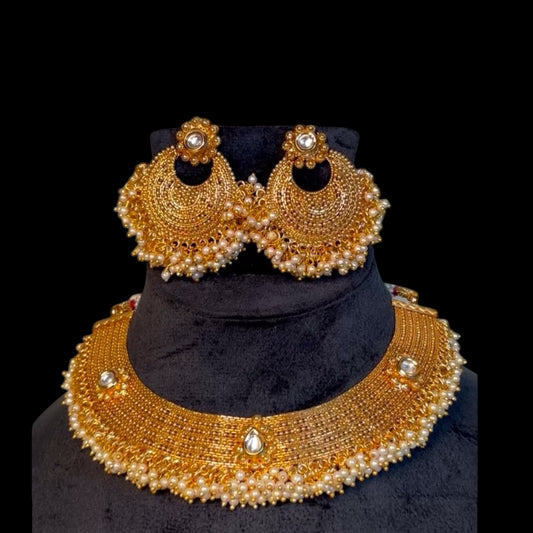 Gold plated necklace set with kundan