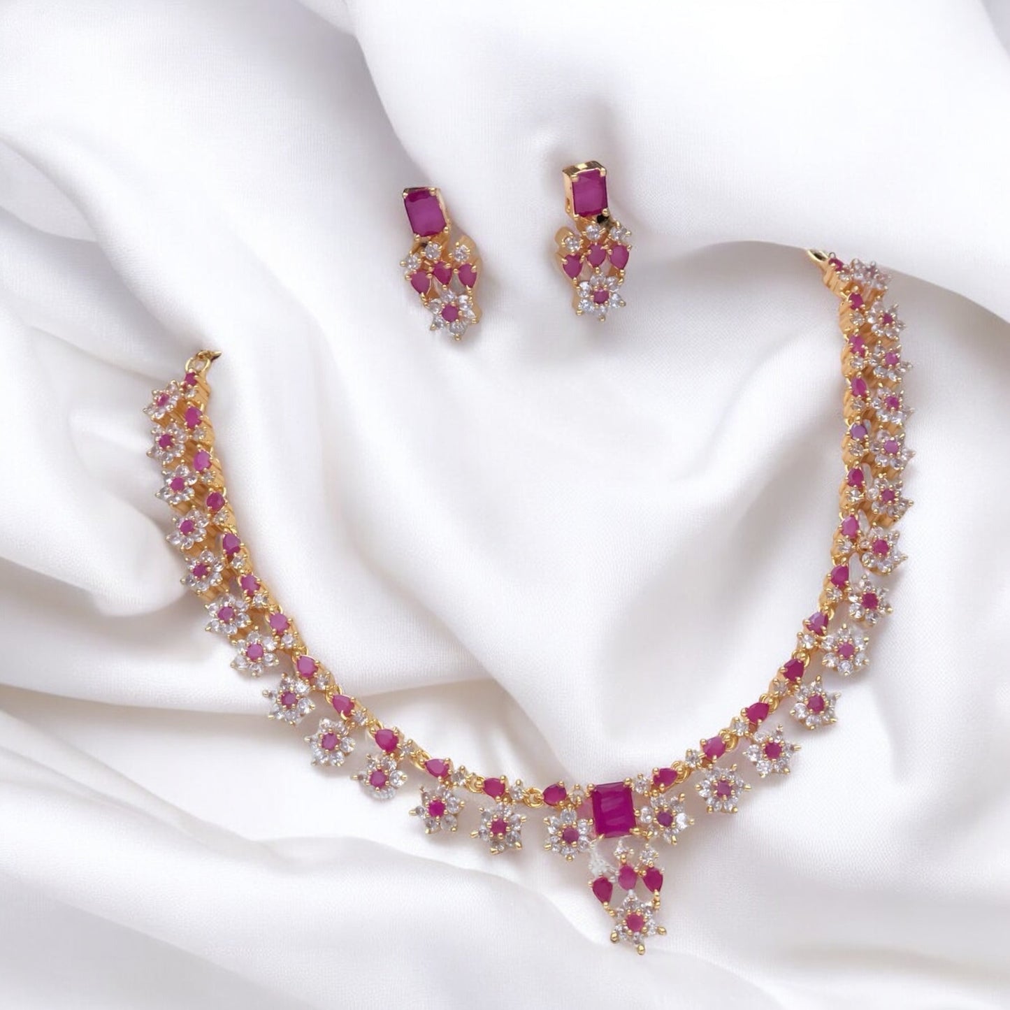 Gold plated American Diamond necklace set with ruby stones
